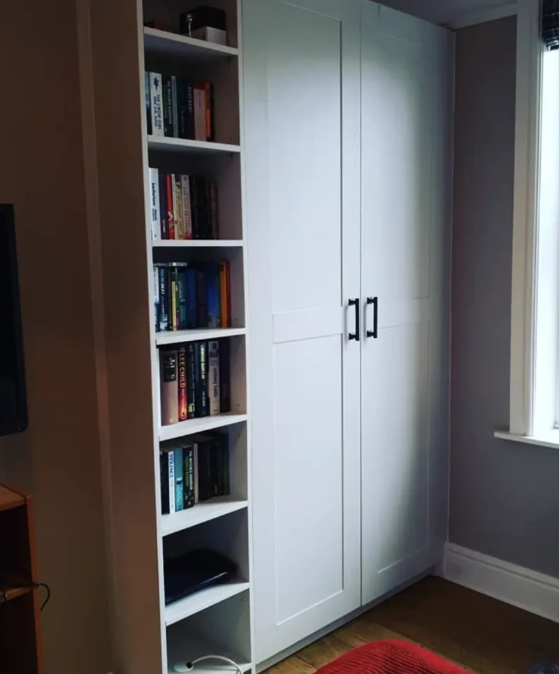 White wardrobe with a built-in bookcase