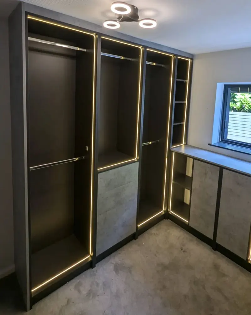 Fitted wardrobes with LED lighting and open hanging space